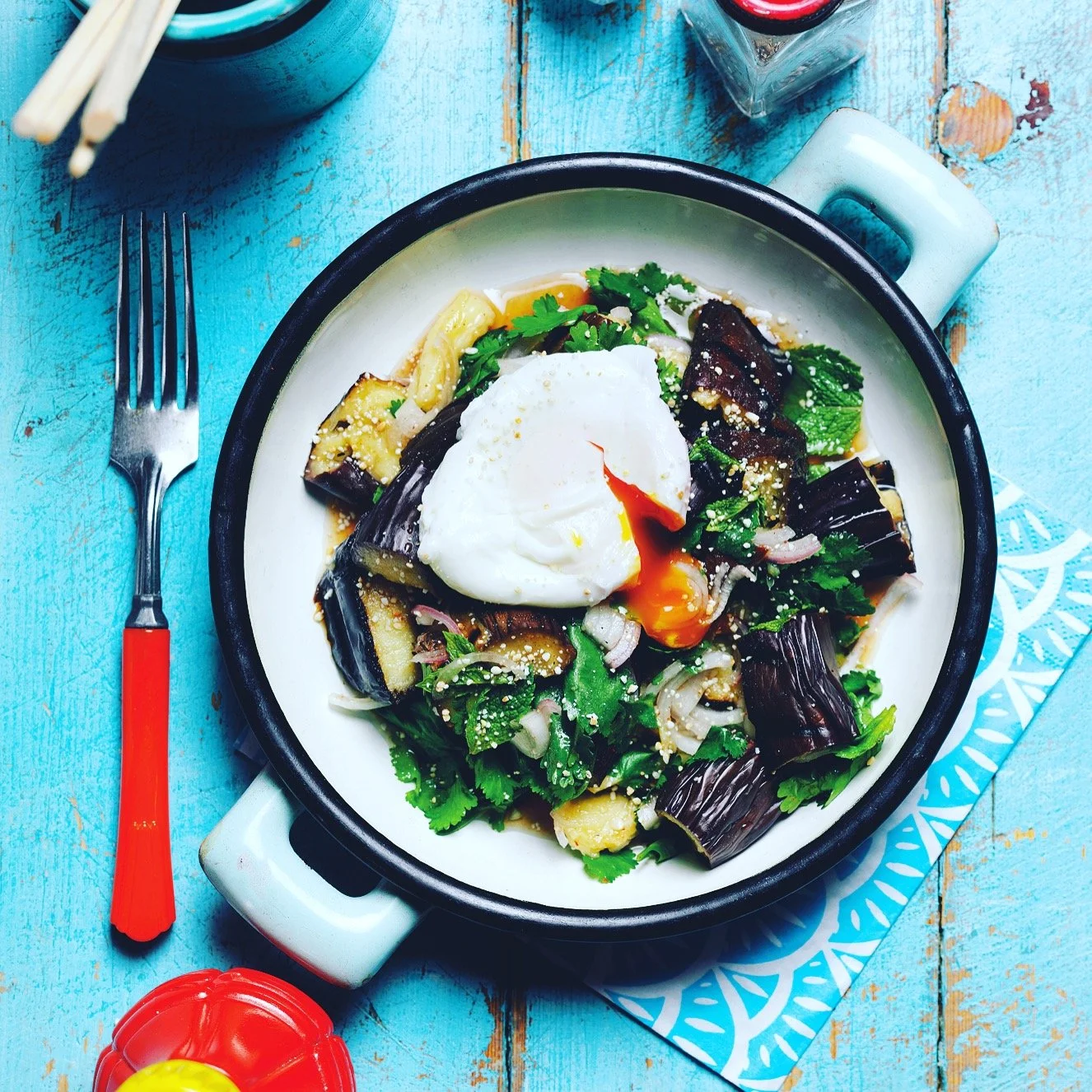Grilled Thai purple aubergine salad with mint, coriander, sesame seeds and soft duck egg in citrus dressing, Farang London