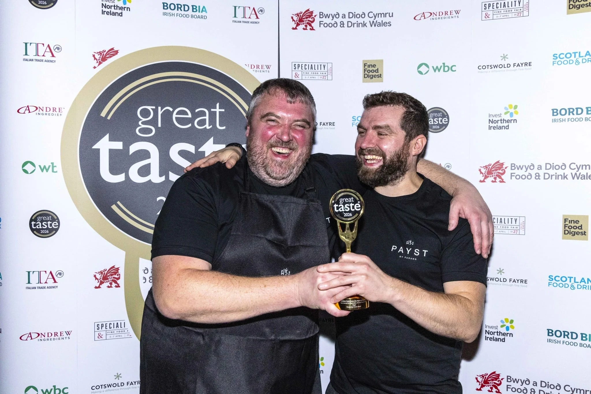 Payst Hung Lay curry paste alongside its Great Taste Golden Fork award, by Sebby Holmes.