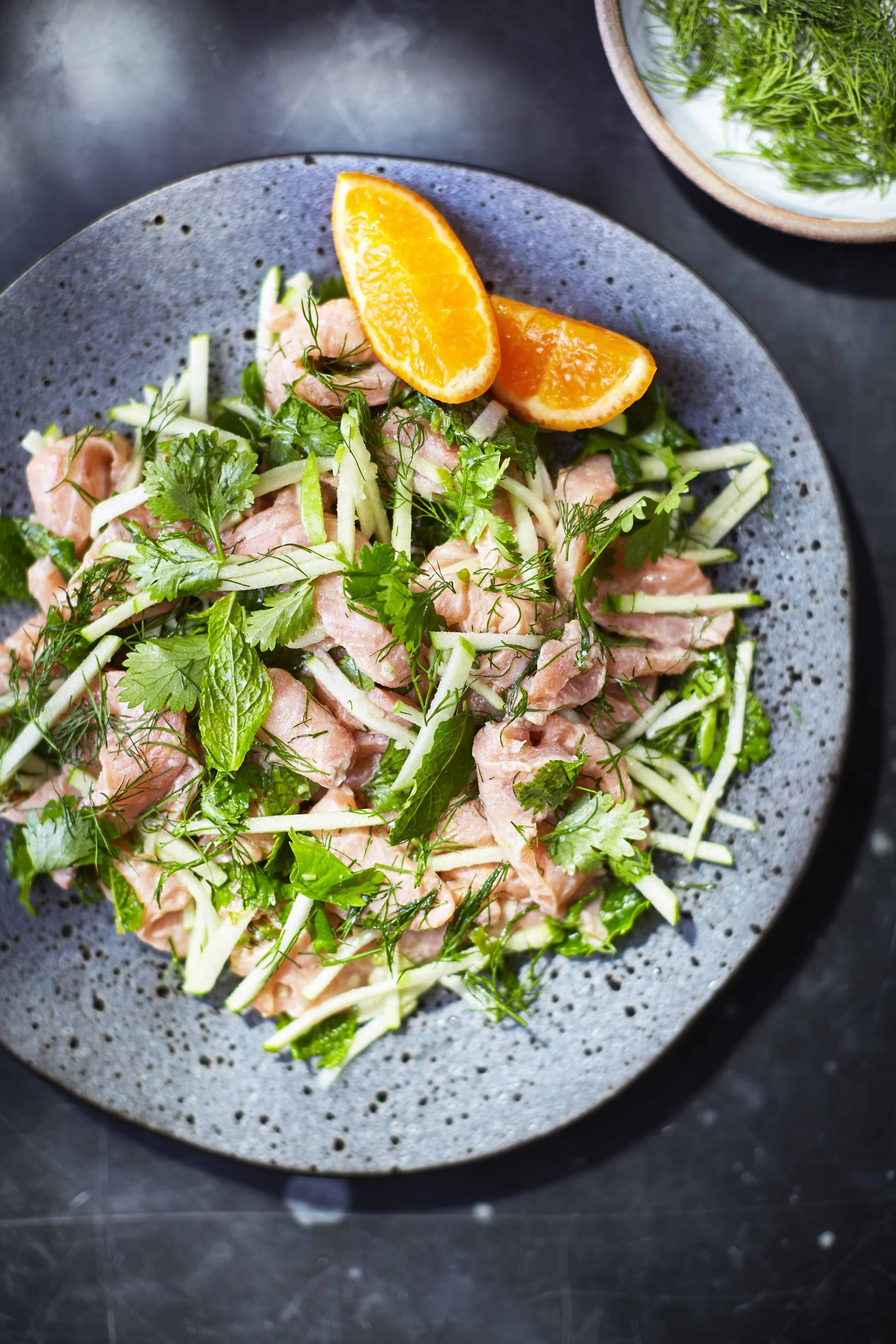 Pan-fried seabass with sour fruits, dill and nahm yum dressing, recipe by Sebby Holmes