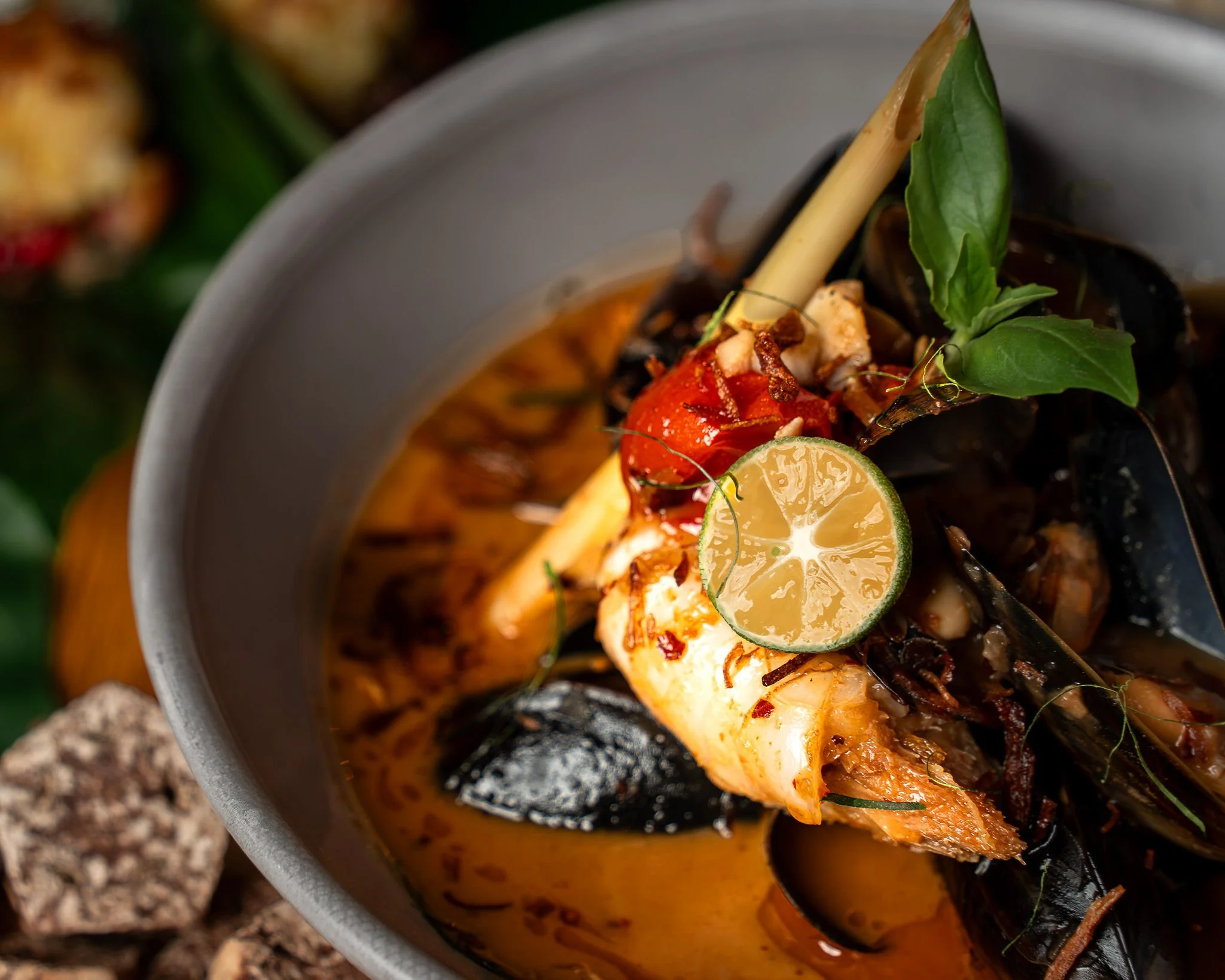 Chilli jam mussels in coconut broth with lemongrass, galangal, lime and Thai basil, recipe by Sebby Holmes.