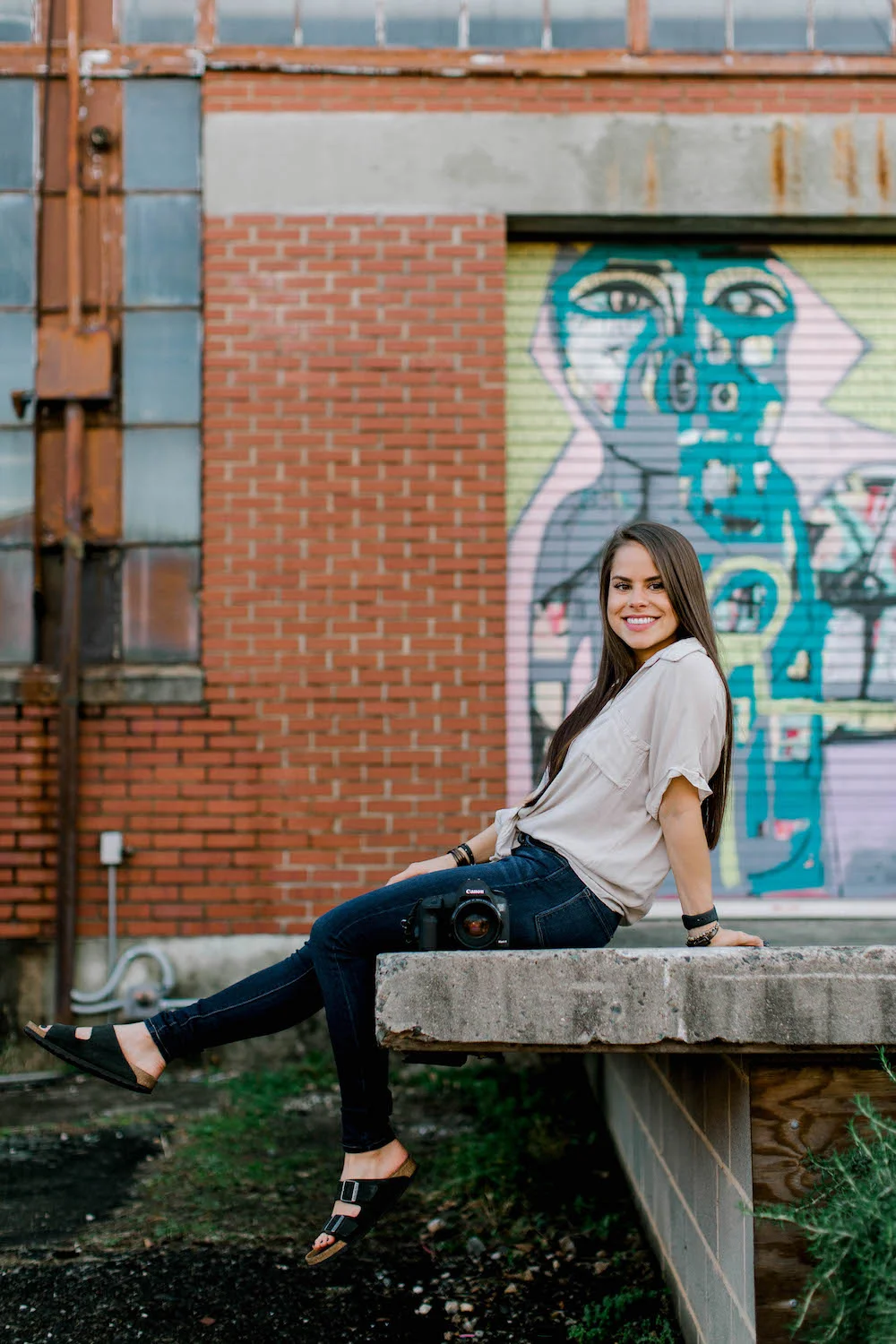 stephanie bailey sitting on an edge.jpg