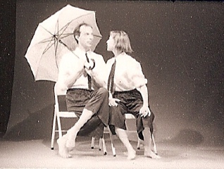 CONSTANCE AND FERDINAND (1991) Constance and Ferdinand is a movement theater piece that borrows text from Gertrude Stein’s 1946 play “Yes is for a Very Young Man .” Stein’s play about a young idealist Ferdinand (Marks) and his charming paramour Constance (Hurlin), was written just as America was emerging from World War II. Constance and Ferdinand was developed as America was entering the first Gulf War. The piece examines personal relationships and sexual mores and asks the question: “If we behave like this personally, is it any wonder that we behave like this globally?” Created by Dan Hurlin and Victoria Marks Performed by Dan Hurlin, Victoria Marks, Margie Citron, Sharon Hayes and Oliver Wadsworth Set design by Dan Hurlin Music composed and performed by Guy Klucevsek Premiered at PS 122, NYC Photo: Lois Greenfield