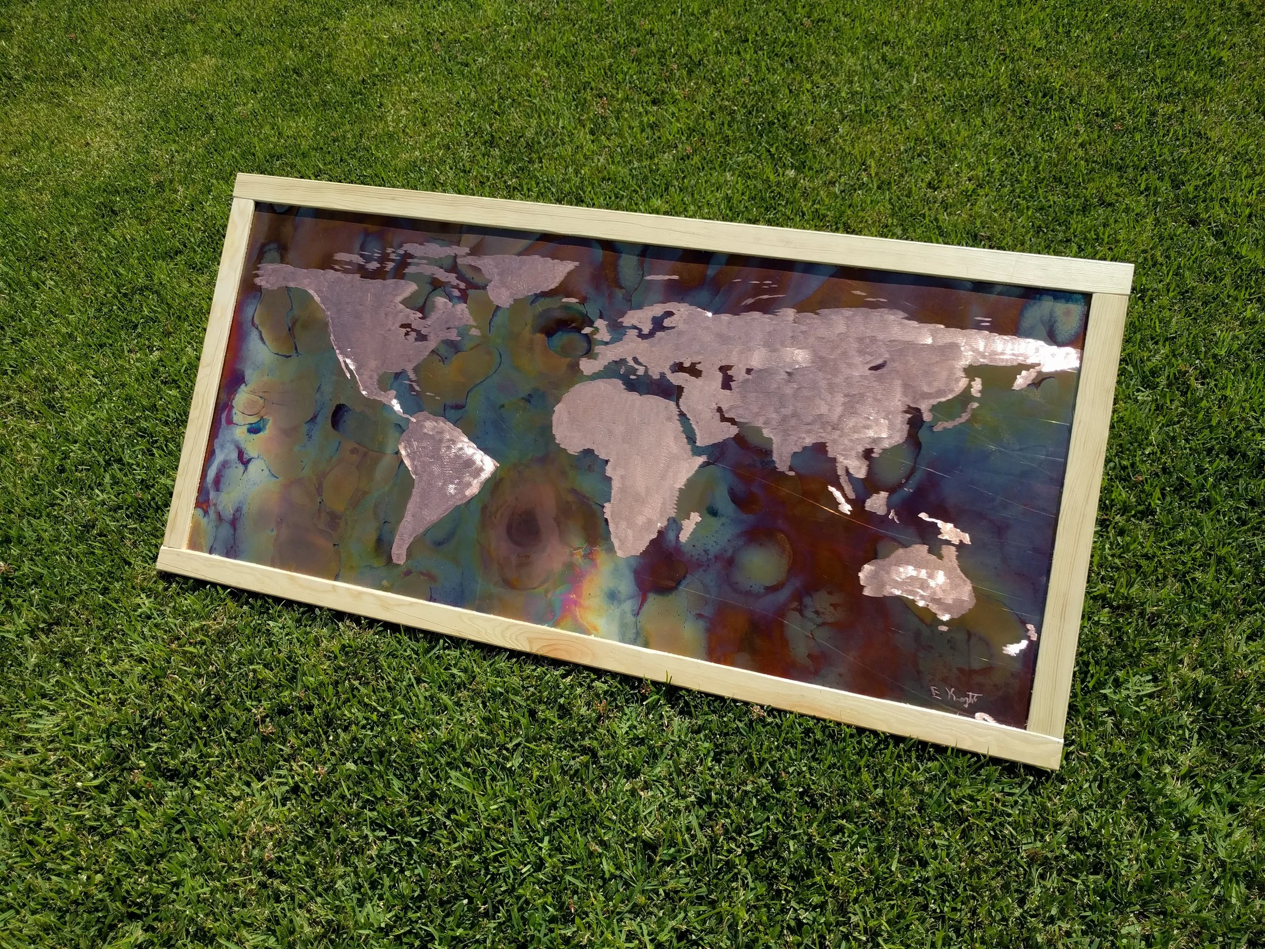Copper sheet with earth etched wood frame
