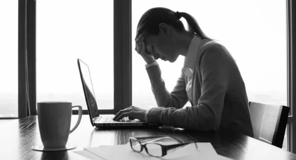 StressedWomanAtWork_large.jpg