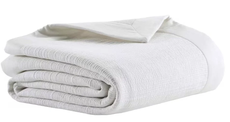 Laela Coverlet-White
