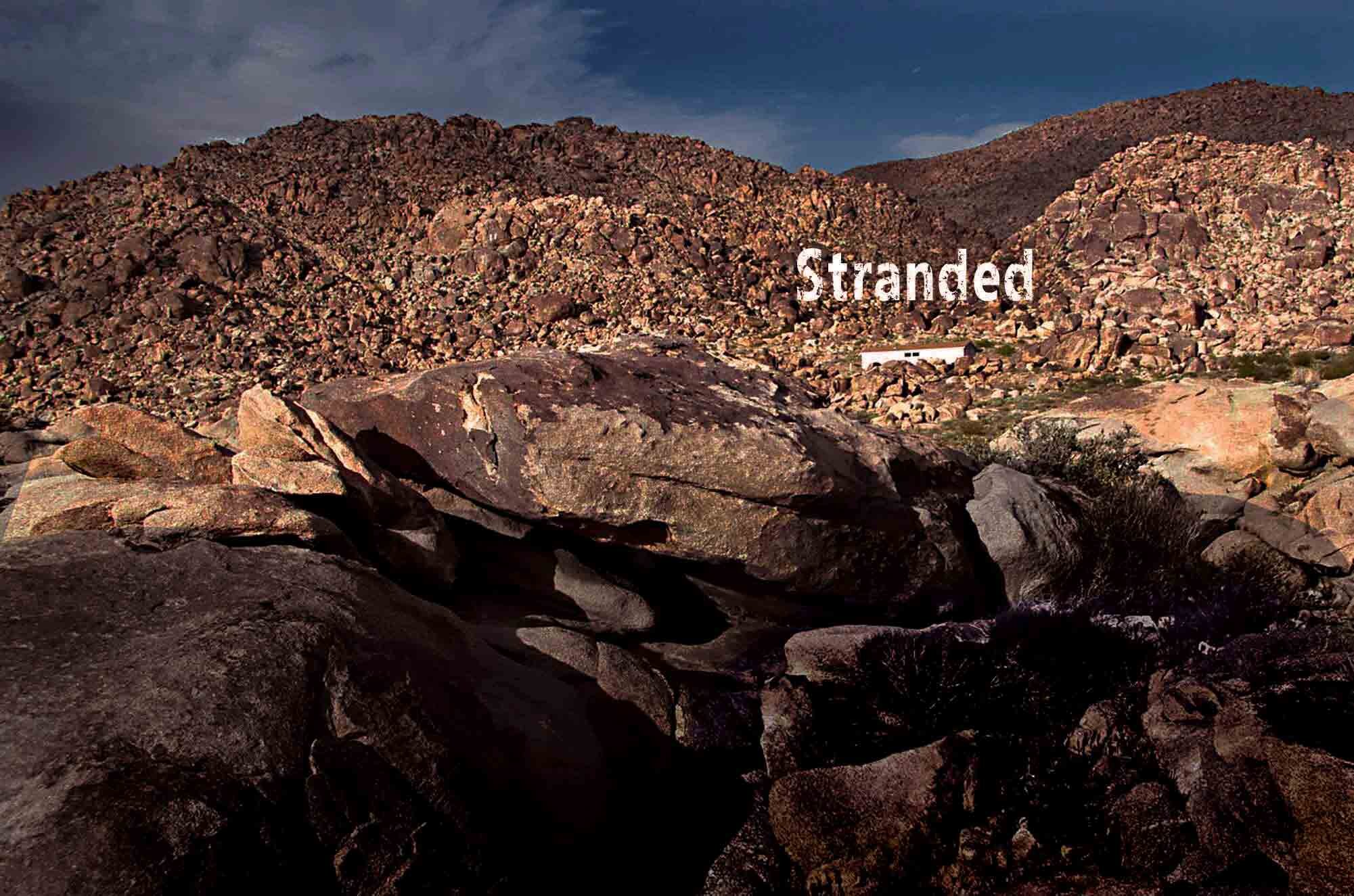 STRANDED--jncdover--image--JT-house-among-rocks--Recovered.jpg