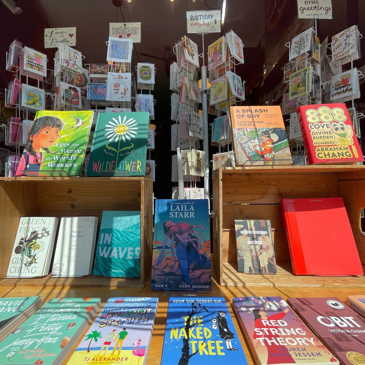 hi friends! happy may! we've got a new window display to share with you -- this month we celebrate Asian American, Native Hawaiian and Pacific Islander Heritage Month, with a few particularly summery reads mixed in! see you around! ☀️