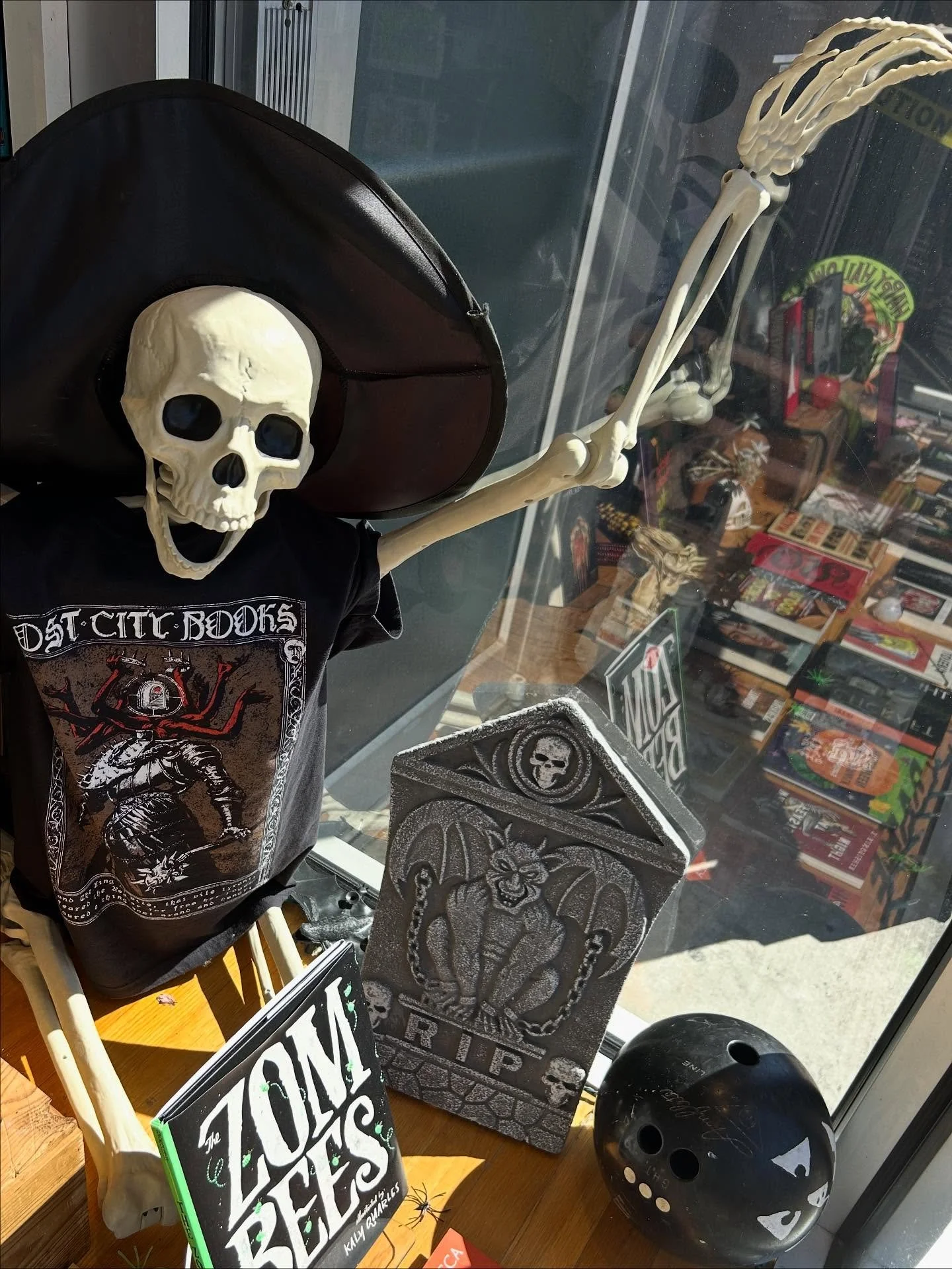 scenes from our horrific window and front wall displays🩸the veil grows thin; the terrors abound&hellip; haunting literature awaits you at 2467 18th st. nw 🎃 open regular hours this weekend and Monday!