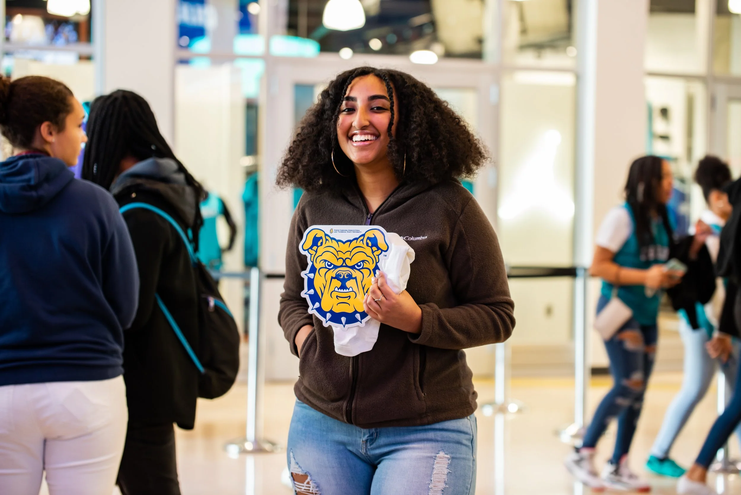 CHARLOTTE 2020 (SPECTRUM) - COLLEGE FAIR (STUDENT WITH AGGIE STICKER).jpg