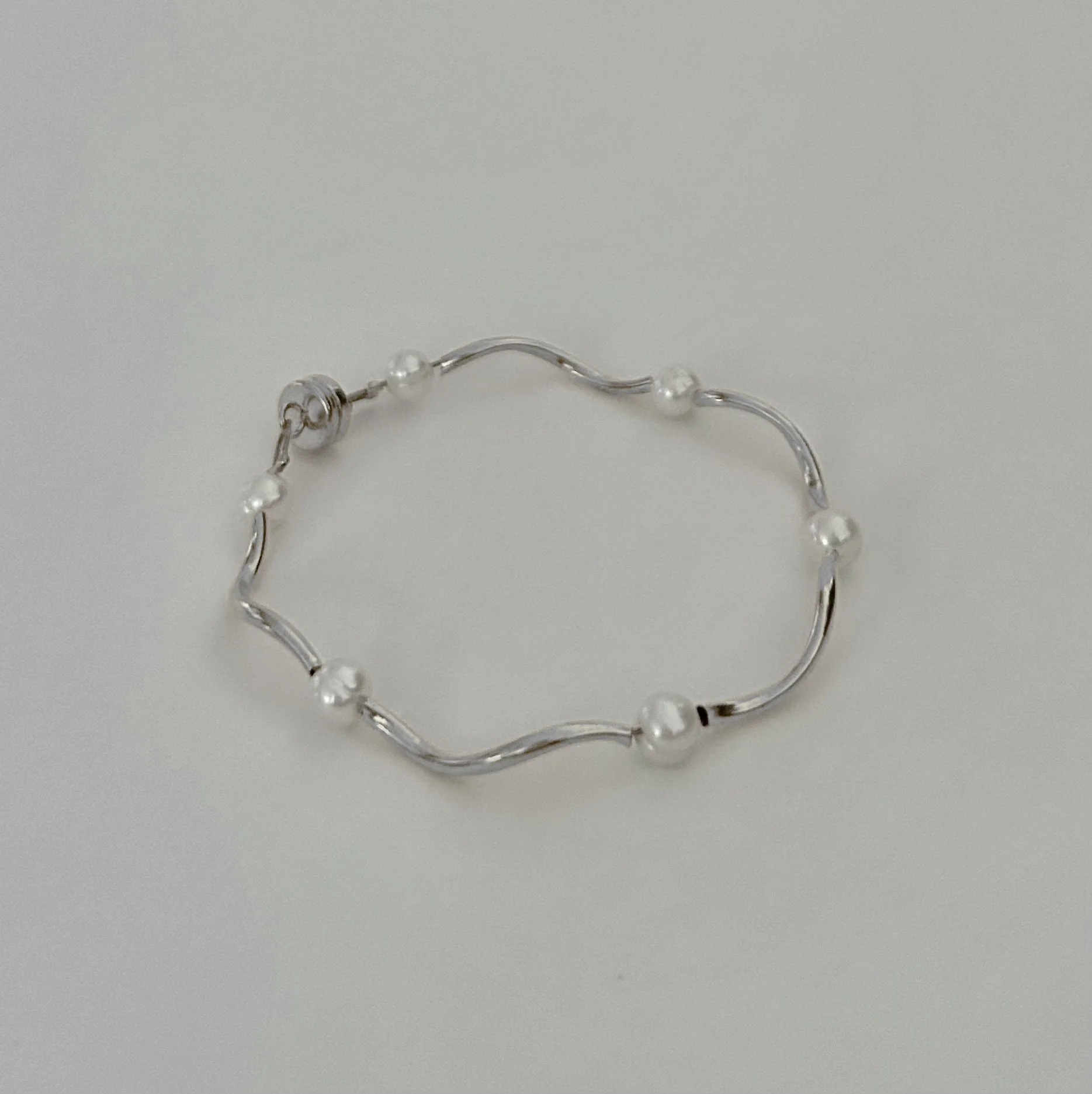 silver pearl squiggle bracelet.jpg