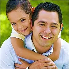 father-with-son-clinging-from-his-neck-from-behind.jpg