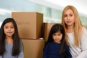 Divorced Mother and Her Two Daughters Ready to Relocate After Packing