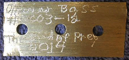 The bass includes a brass plate that reads, "Marino Bass / #0003-12 / The Bird Of Prey / 2014".