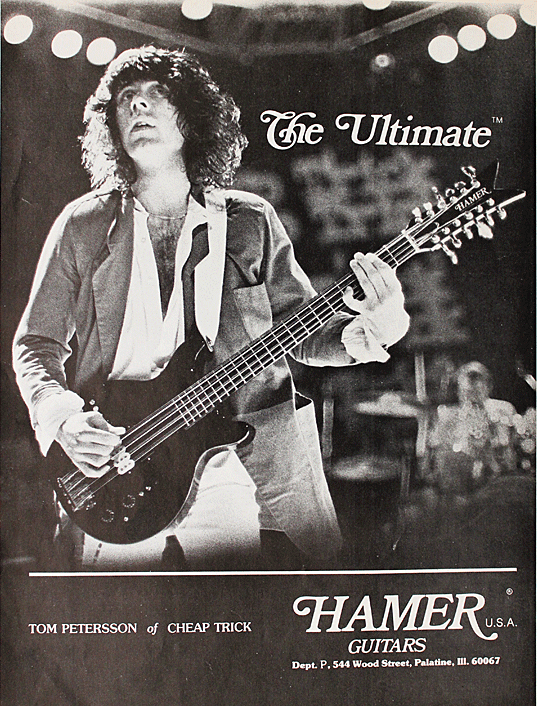 Tom Petersson with the original Hamer Quad Bass after it had been painted black, 1979 to 1980.
