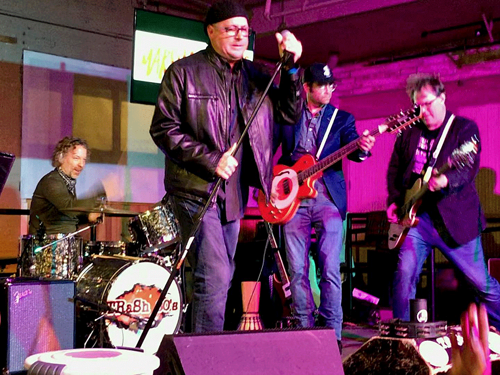 Two 12-string basses on stage at once? You bet! Fundraiser with Daxx Nielsen sitting in on the drum kit playing Cheap Trick’s “California Man”. November 2, 2018.