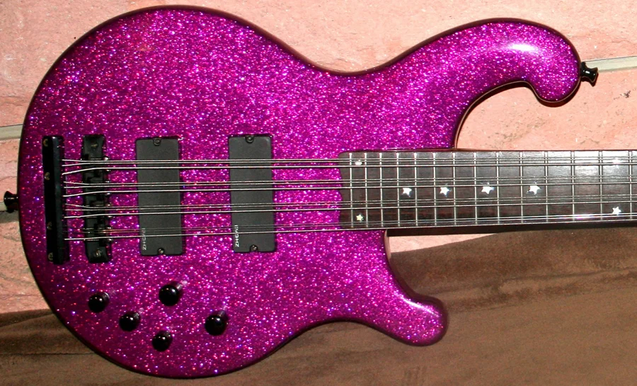 Custom Fuchsia Flake finish with star inlay stickers. The stars were later removed.