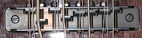 Tune-o-matic style 8-saddle bridge