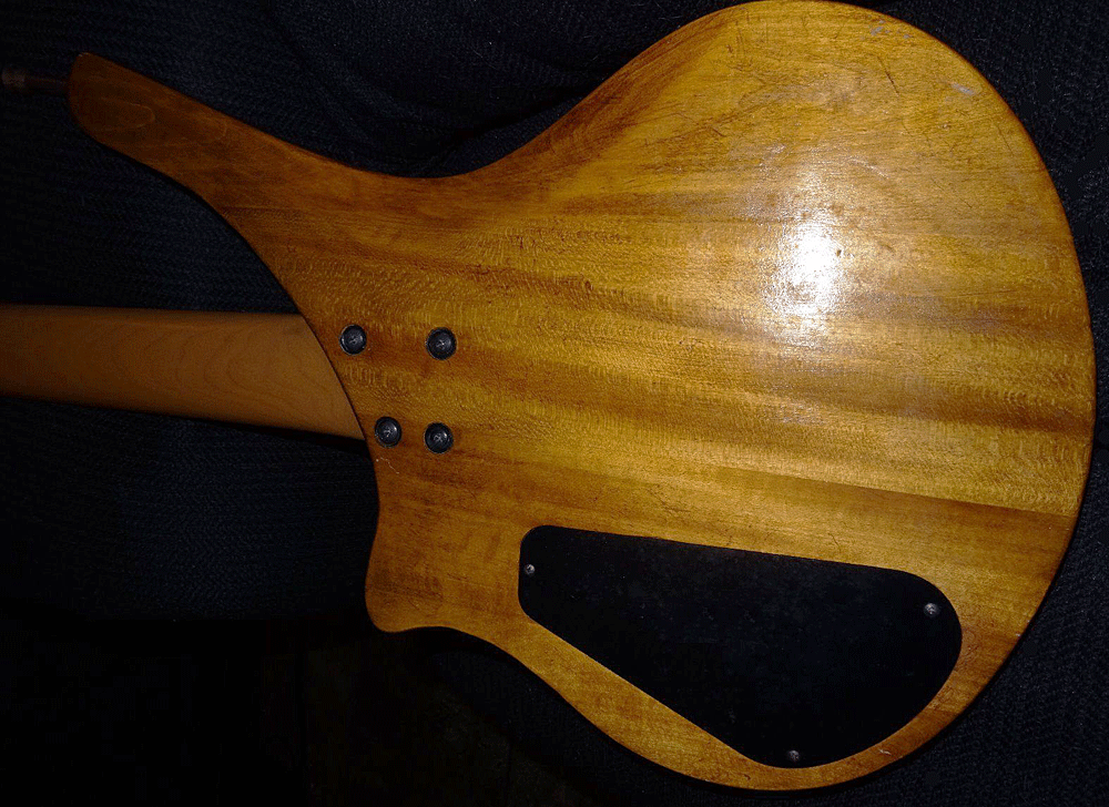 The bass was refinished in a darker lacquer.