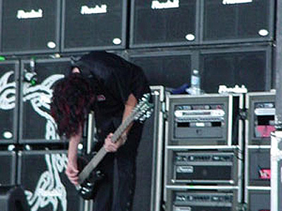 Tim King on stage at Ozzfest 2002 with his Hamer CH-12 12-string bass.