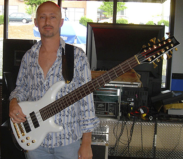 Doyle Moore and his Hades 12-string bass.