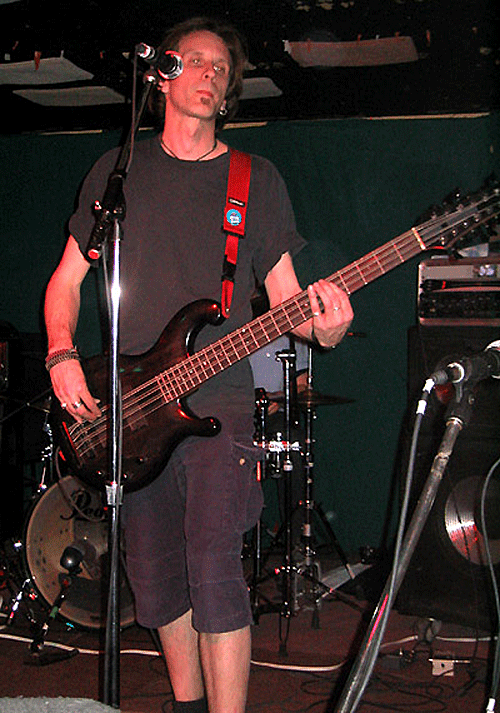 Garth Blake on stage with his Dean Rhapsody 12-string bass.
