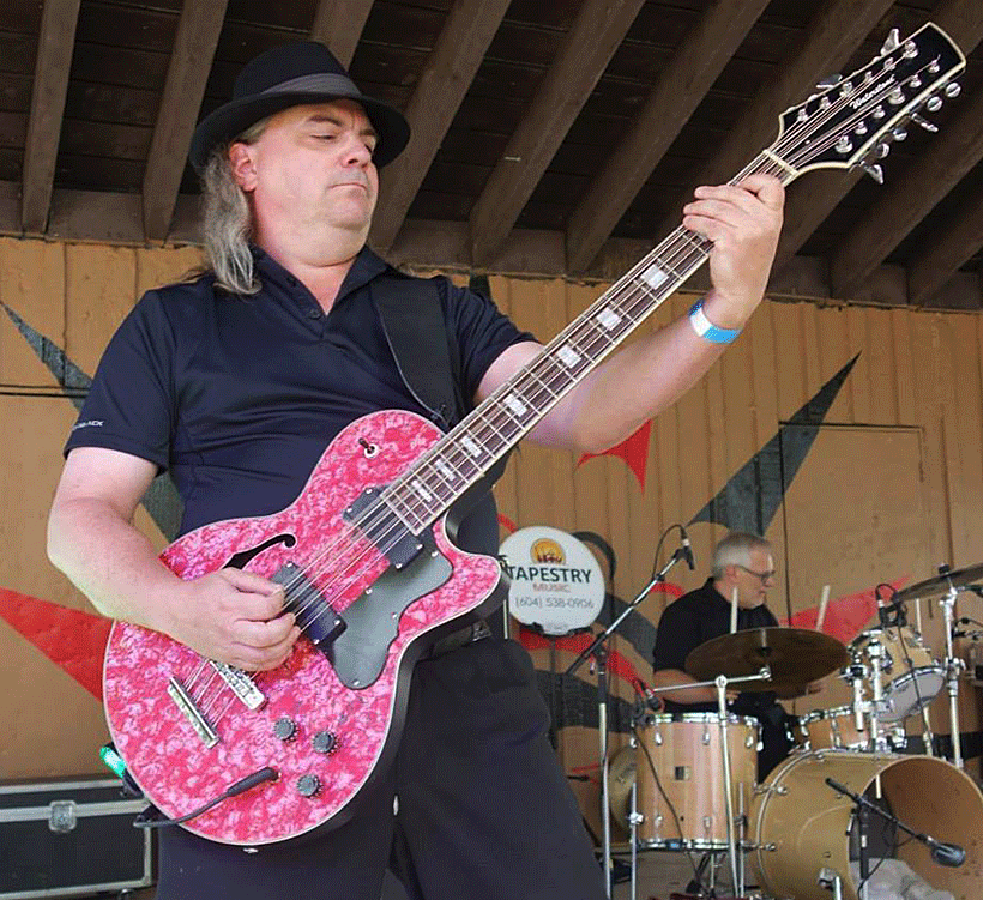 Terry Strudwick and one of his Waterstone 12-string basses.