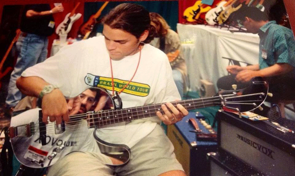 Jaron Lowenstein of the band “Jaron and the Long Road to Love” playing the mirror finish Spaceranger 4-string bass at the 1997 Nashville NAMM show.