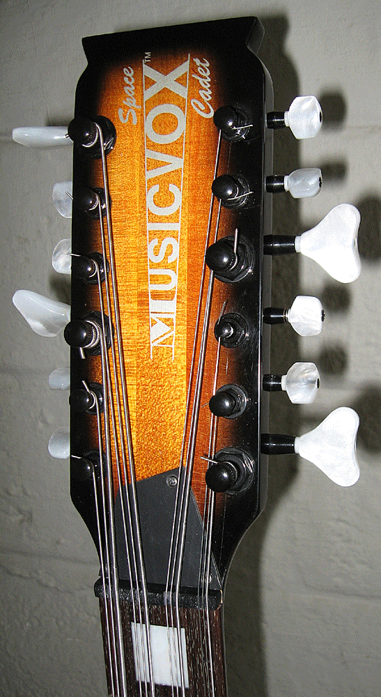 First series sunburst 12's have white tuning pegs.