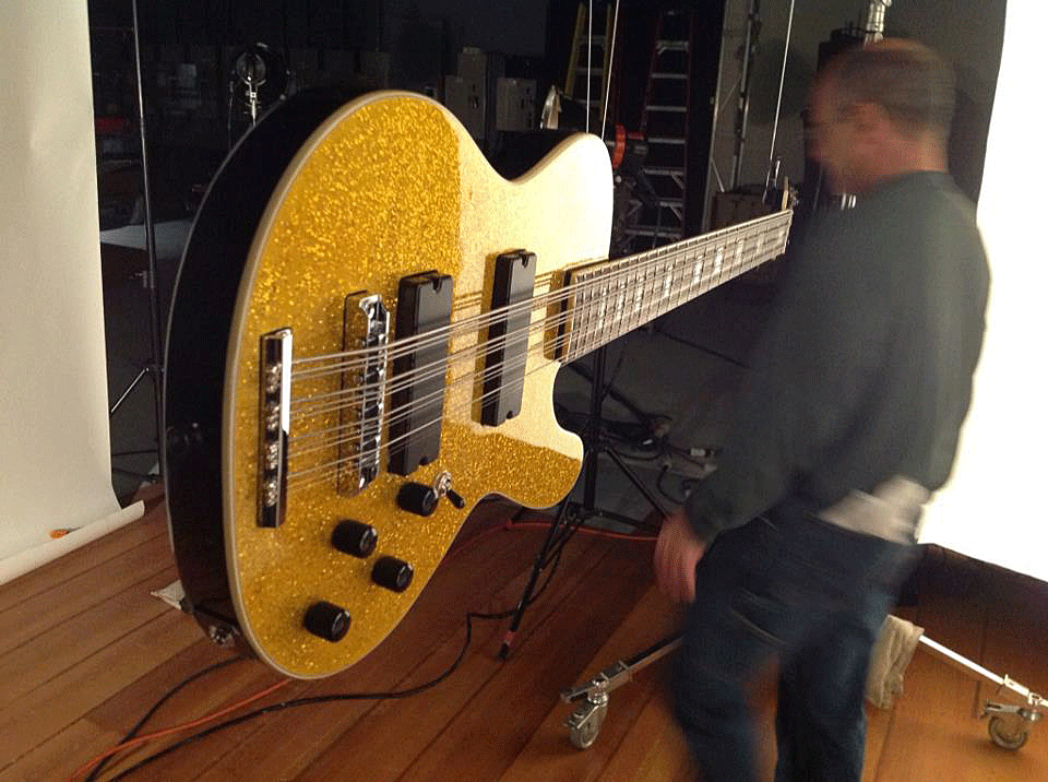 Gold Super Sparkle 12-string bass being prepared for a photo shoot.