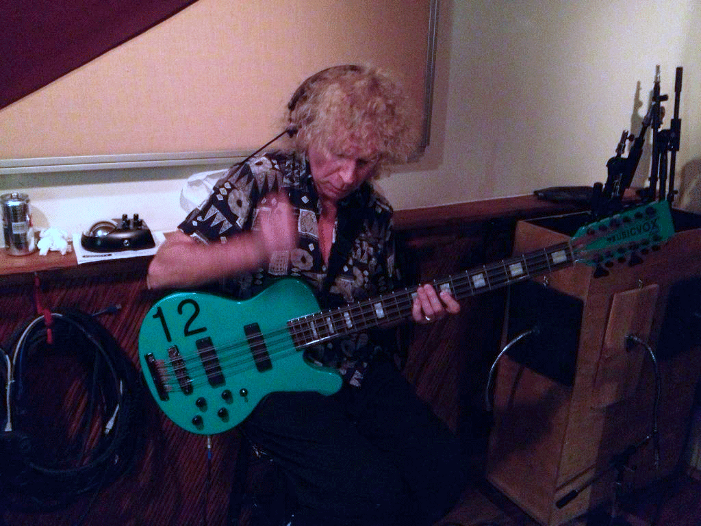 Clint Bahr of Tripod, recording with the Musicvox Seafoam Green Space Cadet 12-string bass.