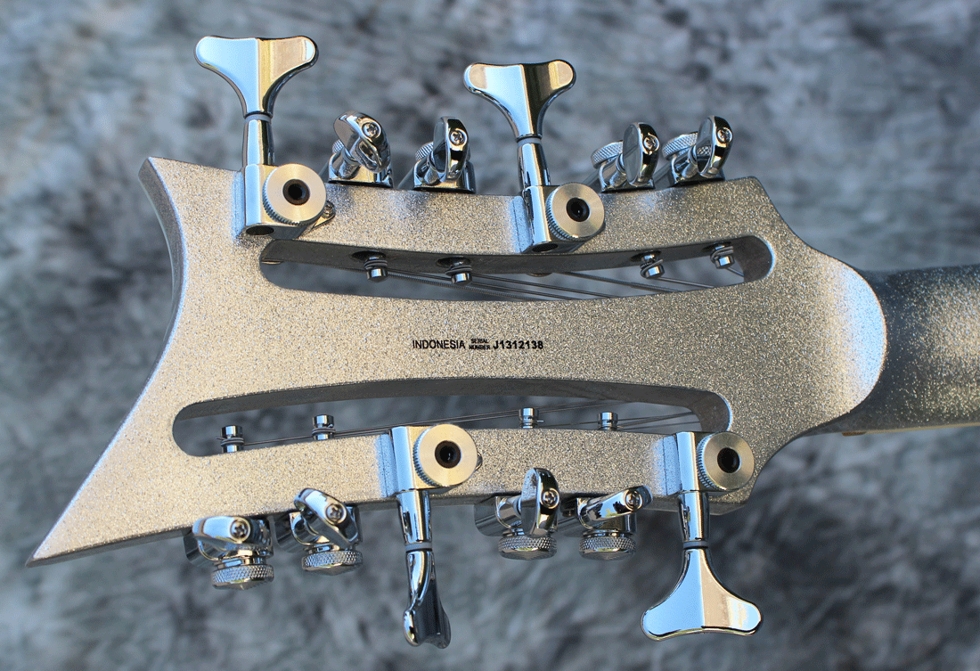 Serial numbers on the MI-5 12-string basses are found centered on the back of the headstock.