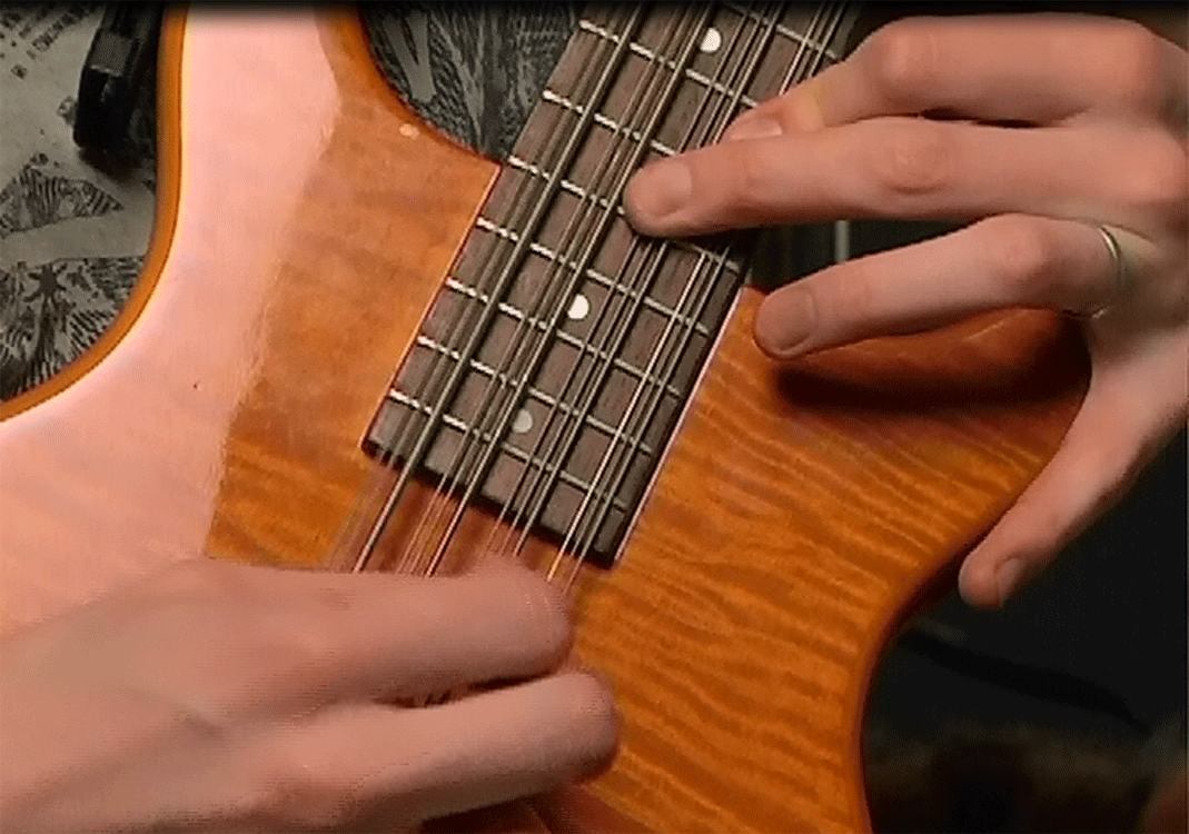 Paul Gilbert playing his Hamer B12S 12-string bass on his instructional video.