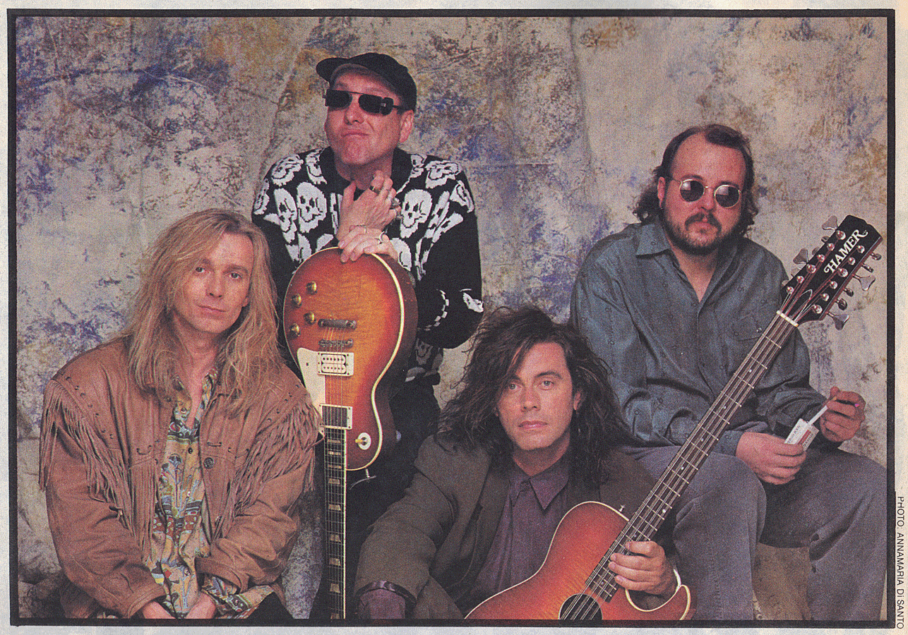 Tom Petersson holds a Hamer B12A 12-string bass.