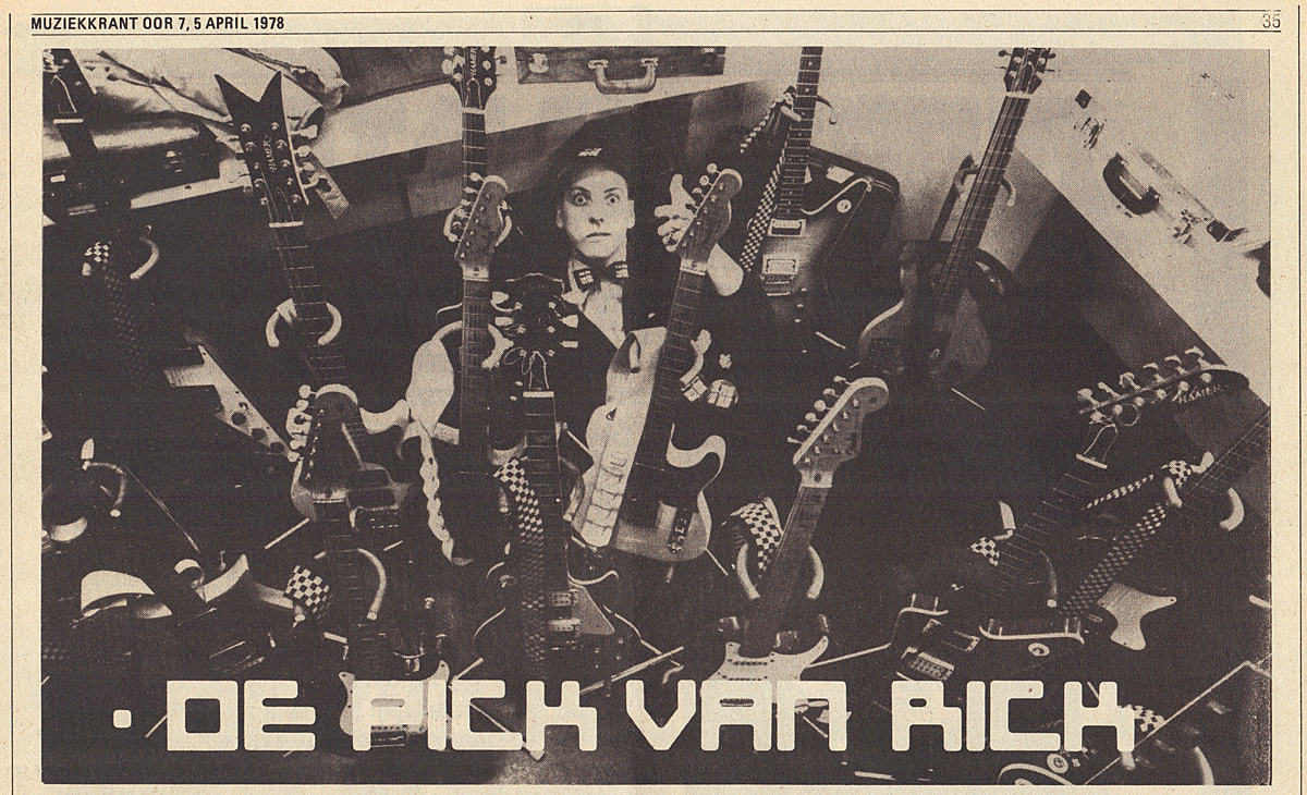 Rick Nielsen surrounded by his guitars, including both the Hamer 10-string and Hamer Quad 12-string basses.