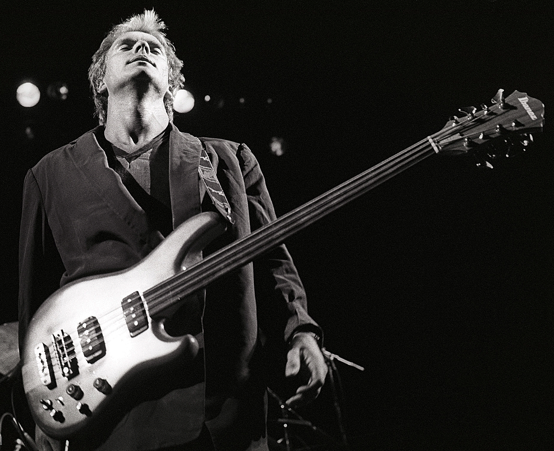 Sting with an Ibanez fretless 8-string bass.