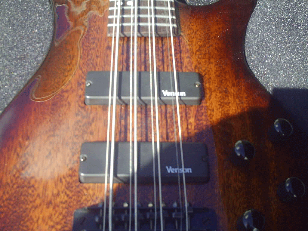 Close-up of the body of the Venson 8-string bass.