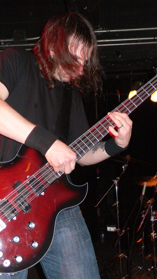 Jeff Matz on stage with his First Act 12-string bass.
