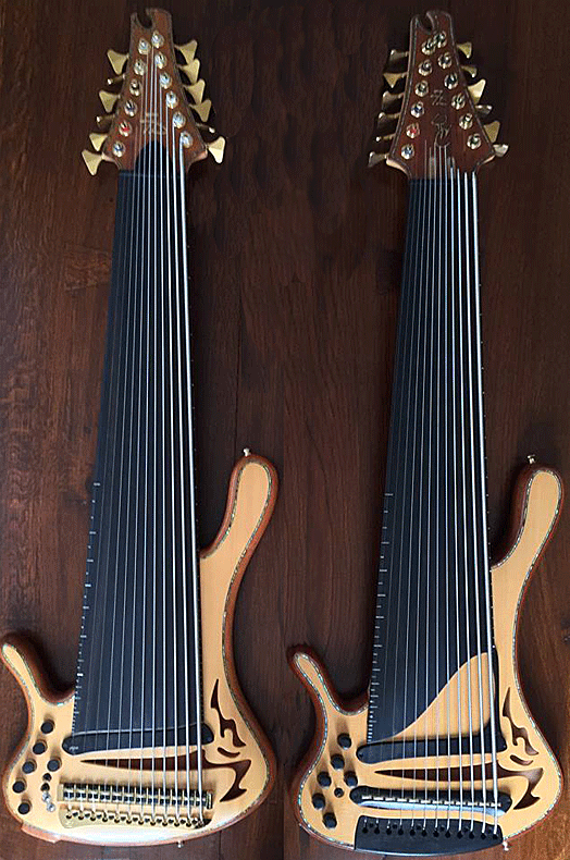 Two left-handed fretless extended range 12-string basses.