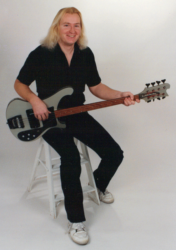 Surf had this fretless Rickenbacker 8-string bass custom built in 1987; he played it at 600 gigs over a dozen years. This is the instrument that started him down the path towards total 12-string bass madness!