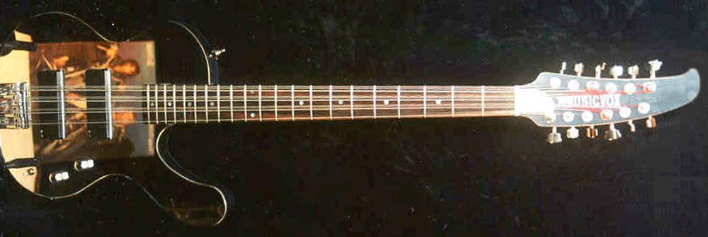 1998 Musicvox custom mirror-finish Spaceranger 12-string bass, reflecting Cheap Trick’s “In Color” album.
