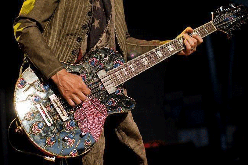 Tom Petersson’s custom Peacock finish Waterstone 12-string bass