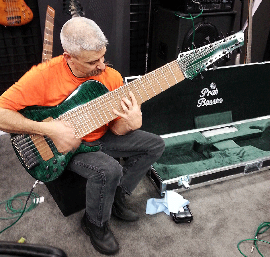 Christopher Cardone playing his 24-string Prat bass at the NAMM show.