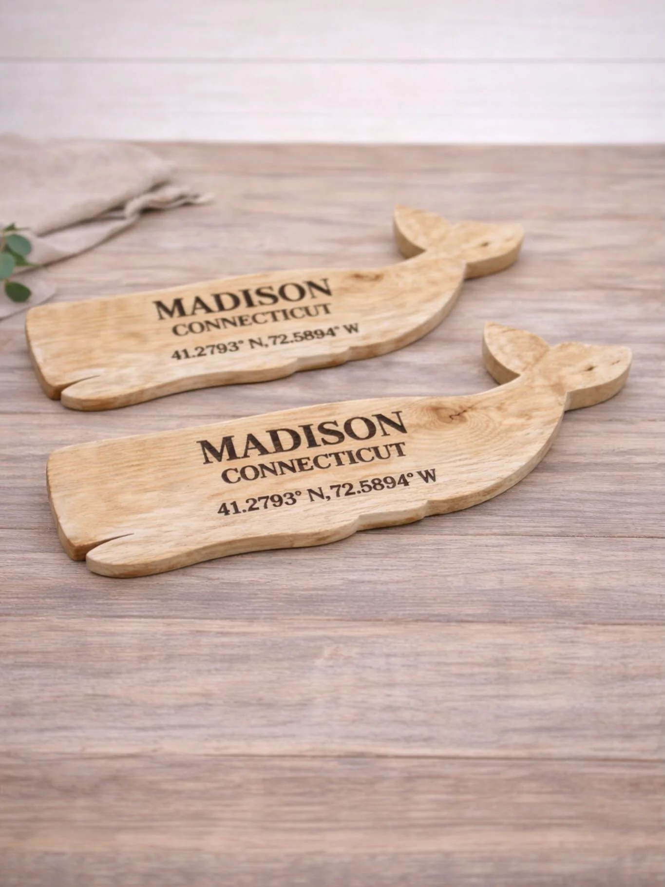 Naturally coastal, beautifully personal. 
These locally made engraved whales feature Madison, CT with exact coordinates; making them a meaningful keepsake for locals, visitors, or anyone who holds the shoreline close to heart.

Perfect for gifting or