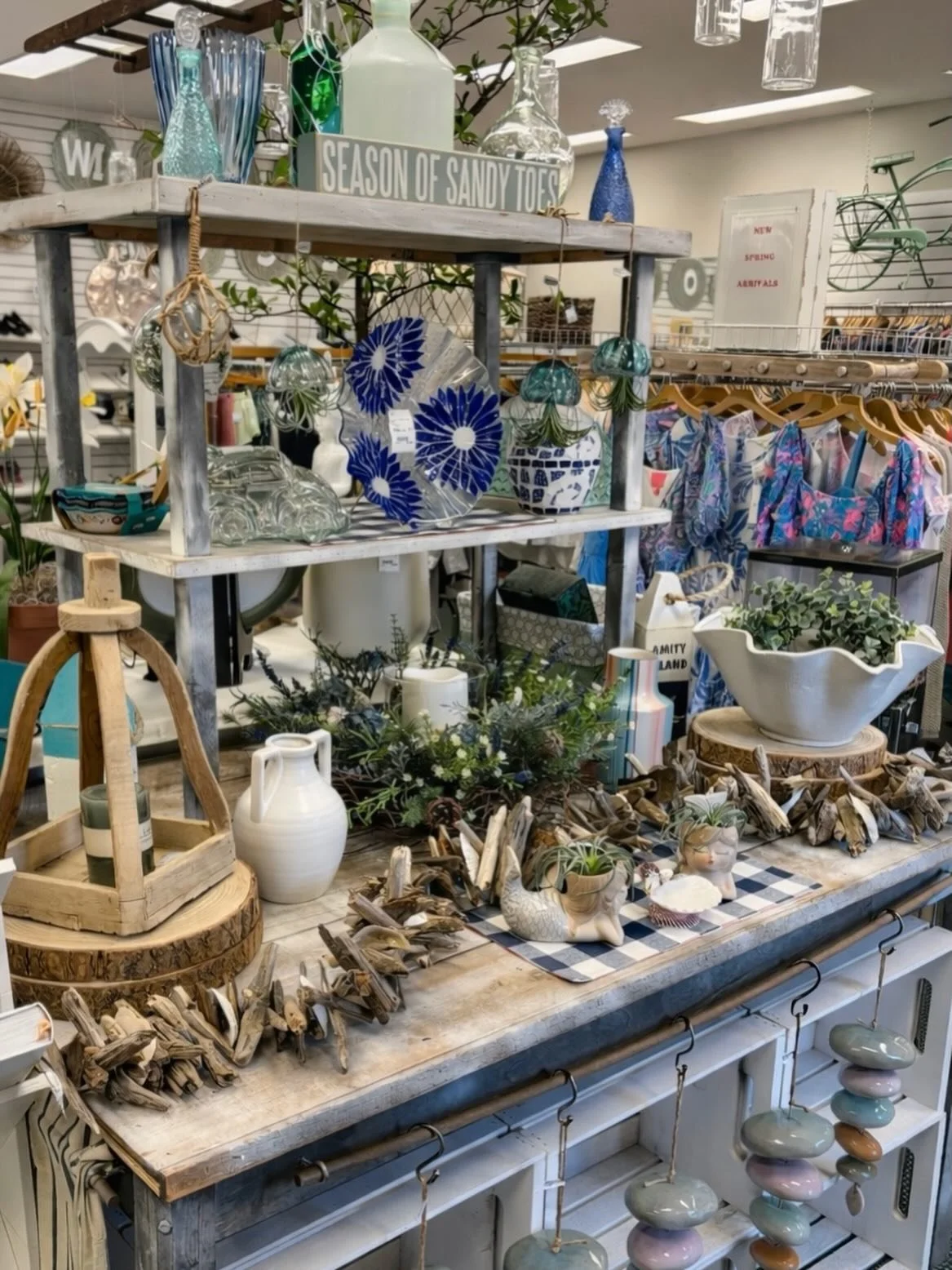 Season of sandy toes and fresh finds!

From coastal glass and driftwood details to soft-sounding wind chimes and fresh floral touches, this table is giving all the spring and summer vibes. Stop in and see what treasures are waiting for you at Molly R