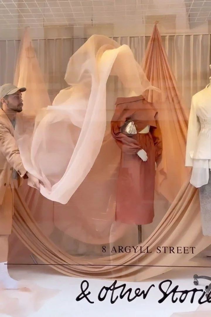 pastel sheer fabric window display
