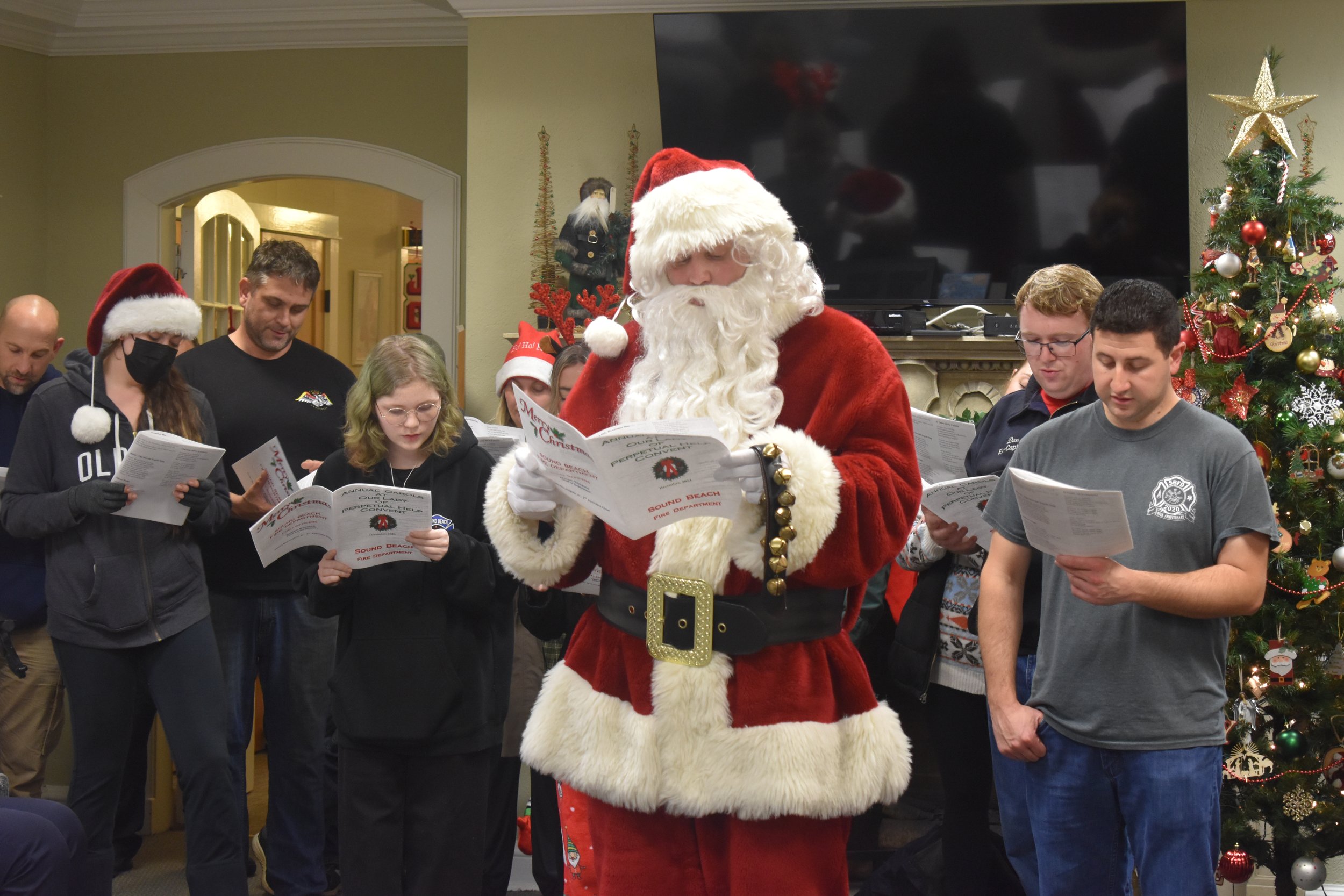 Sound Beach Fire Department Sings Christmas Carols At Our Lady Of Perpetual Help Convent