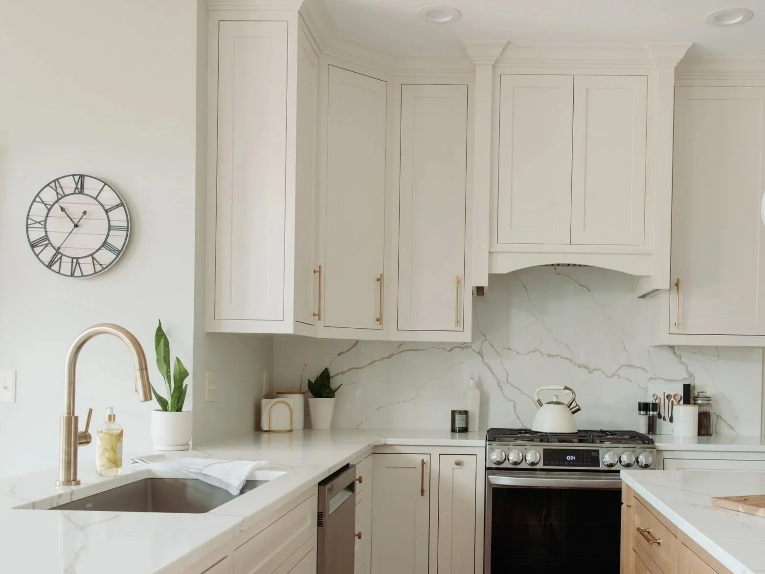  White Quartz Countertop and Backsplash.  Customer Cabinets from Creekside. 