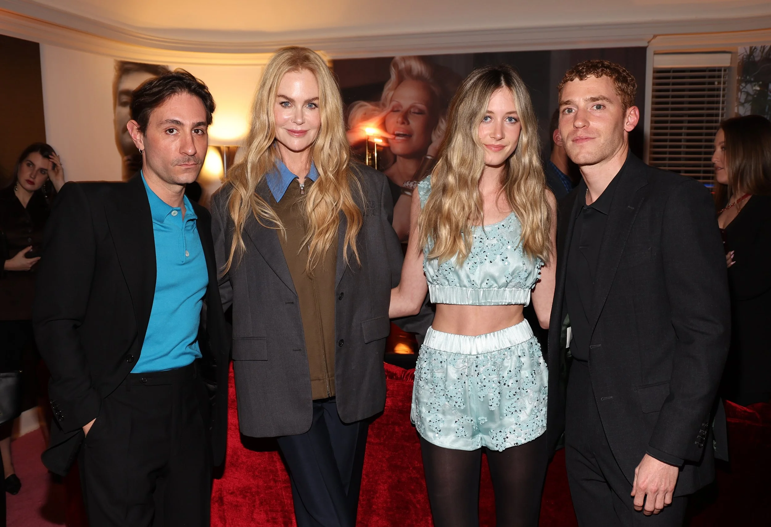 Actress Nicole Kidman posing with a group of attendees at a W Magazine Best Performances event produced by Missy Meyer.