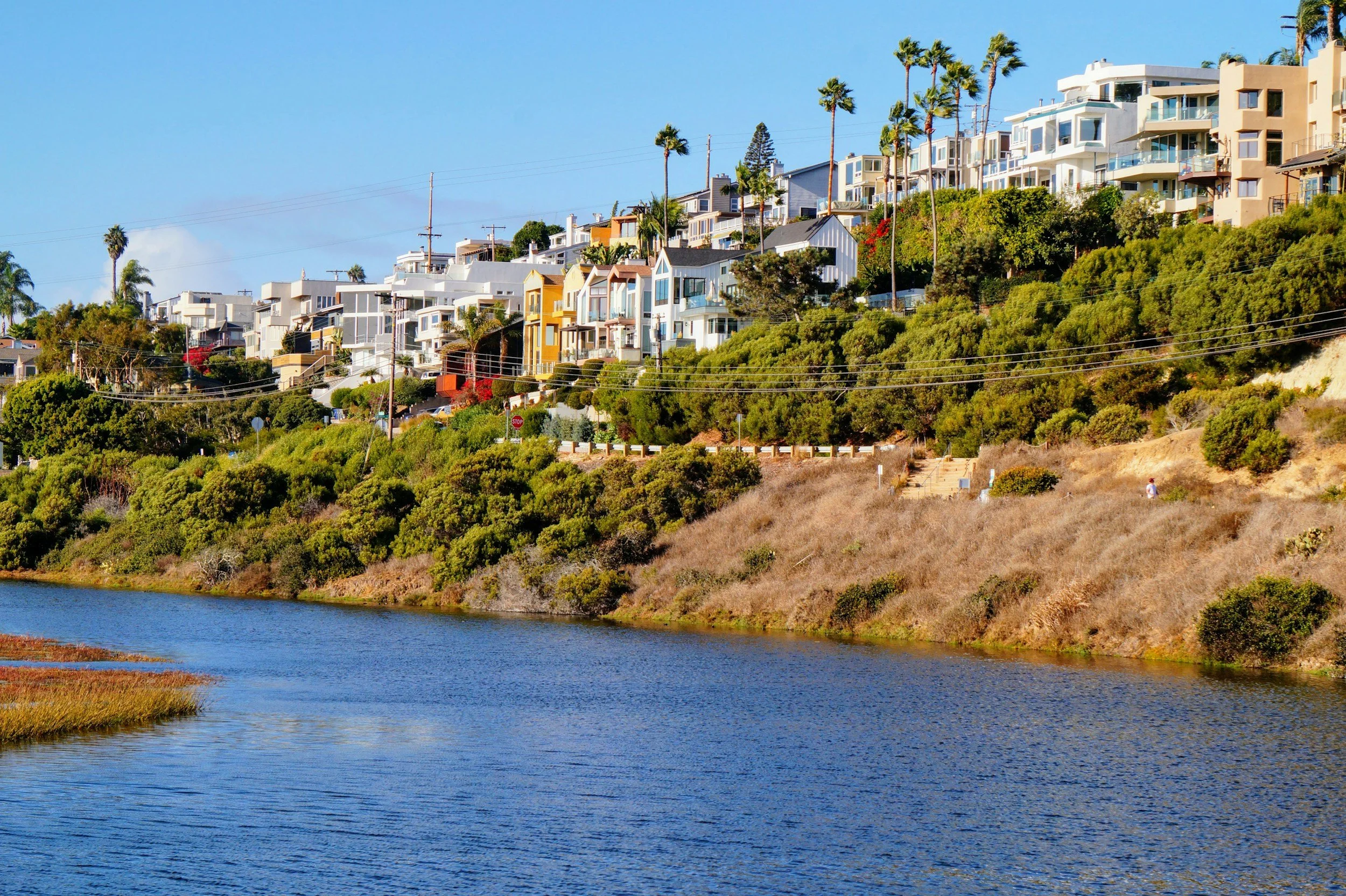 Hillside homes overlooking a coastal lagoon