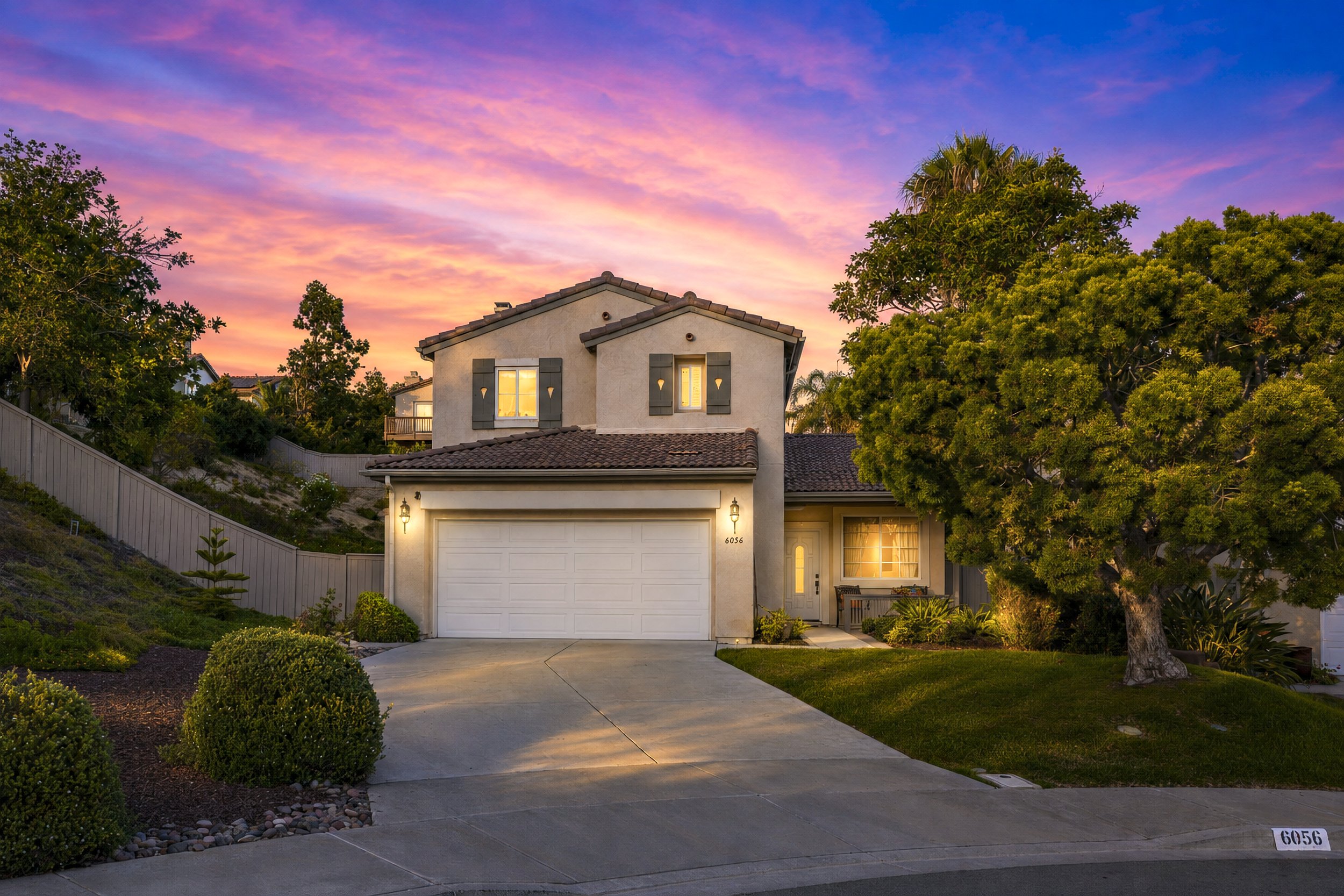 Twilight exterior real estate photo of a San Elijo Hills home in San Marcos, California